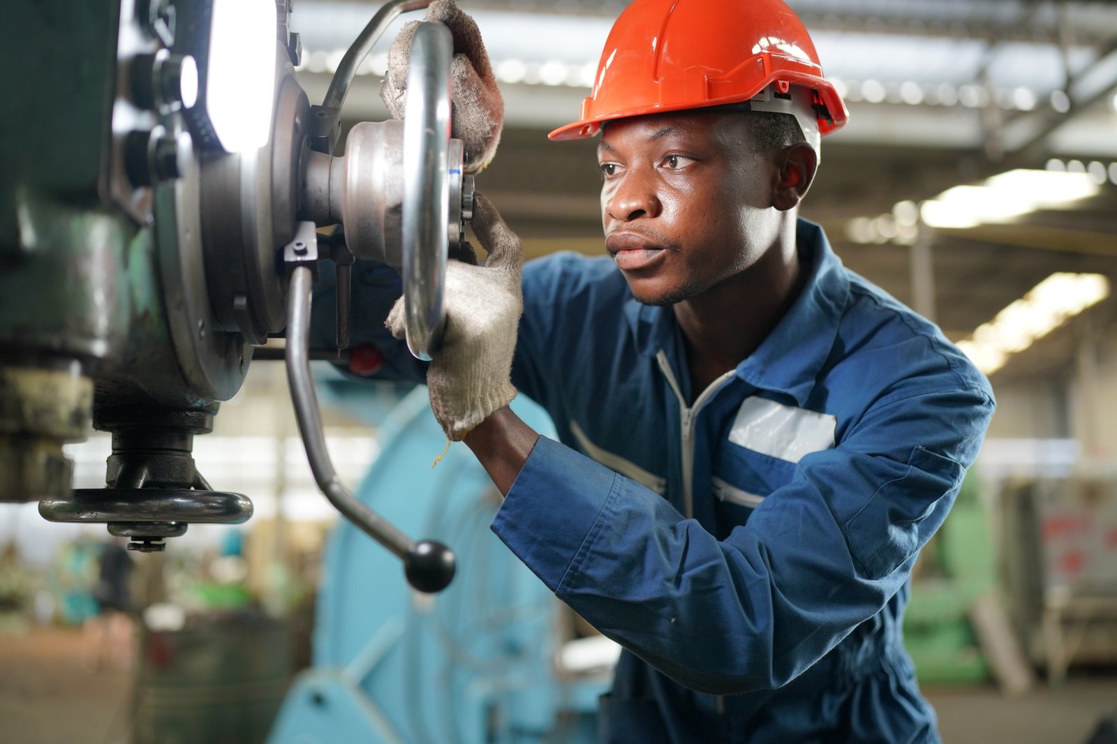 Factory Engineer Operating machines in industry factory.